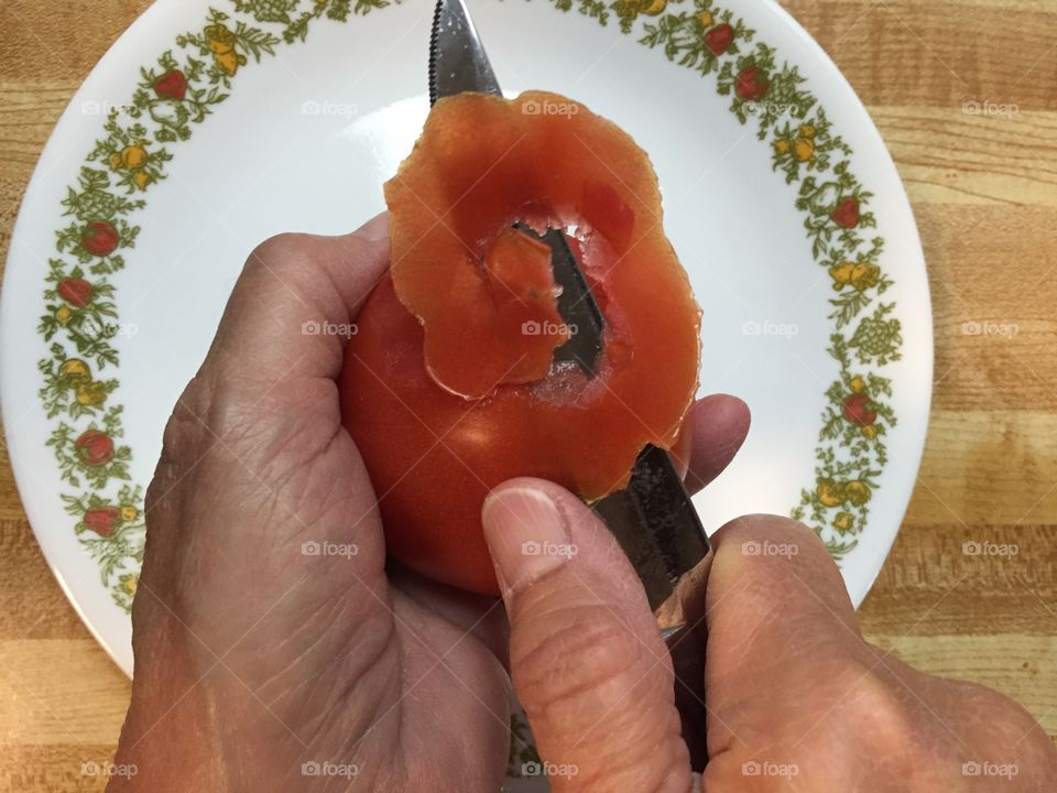 Peeling a tomato