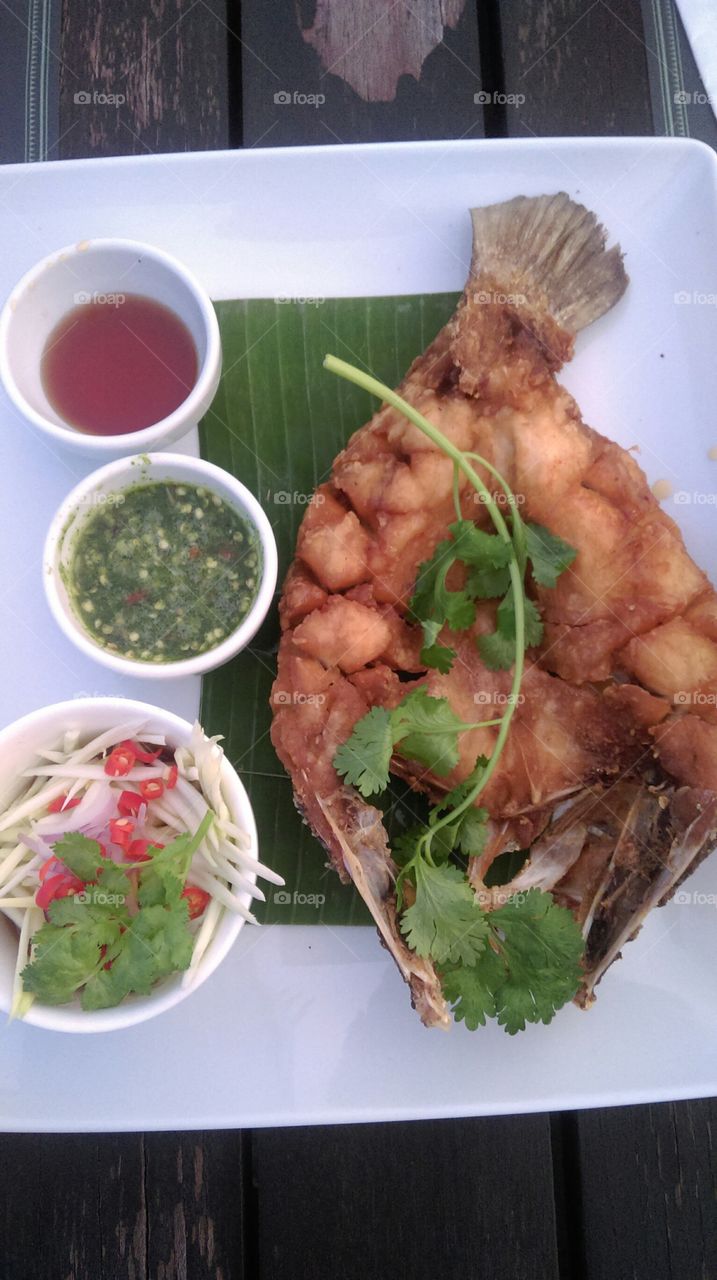 Fried fish with spicy sauce,Thai food,Asian food,Asian Cuisine.