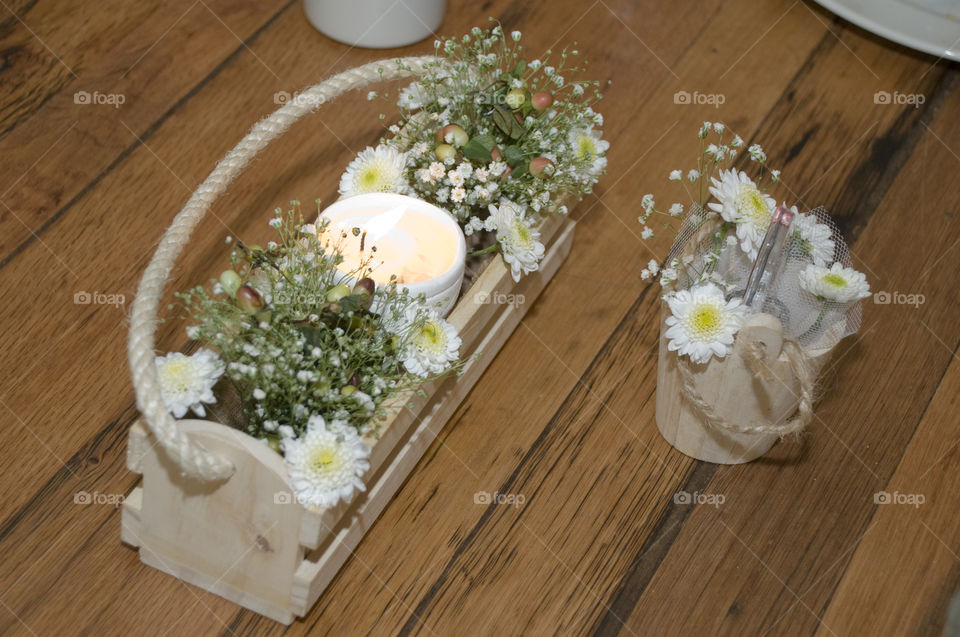 Decoration with Flowers candles on a table