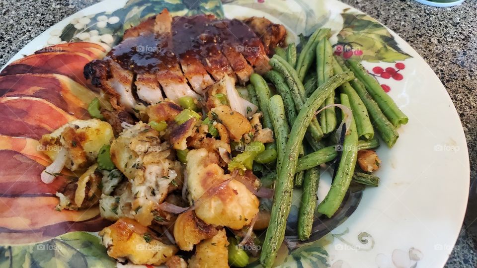 can't beat homemade stuffing and fig jam sauce served with juicy pork chop 🤤