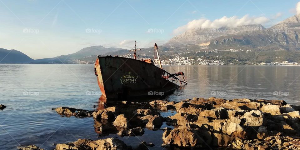 Montenegrian coast, summer day, nautical theme, lost ship.