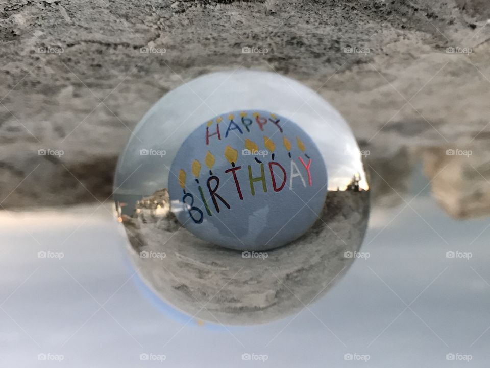 Happy Birthday message through a crystal globe