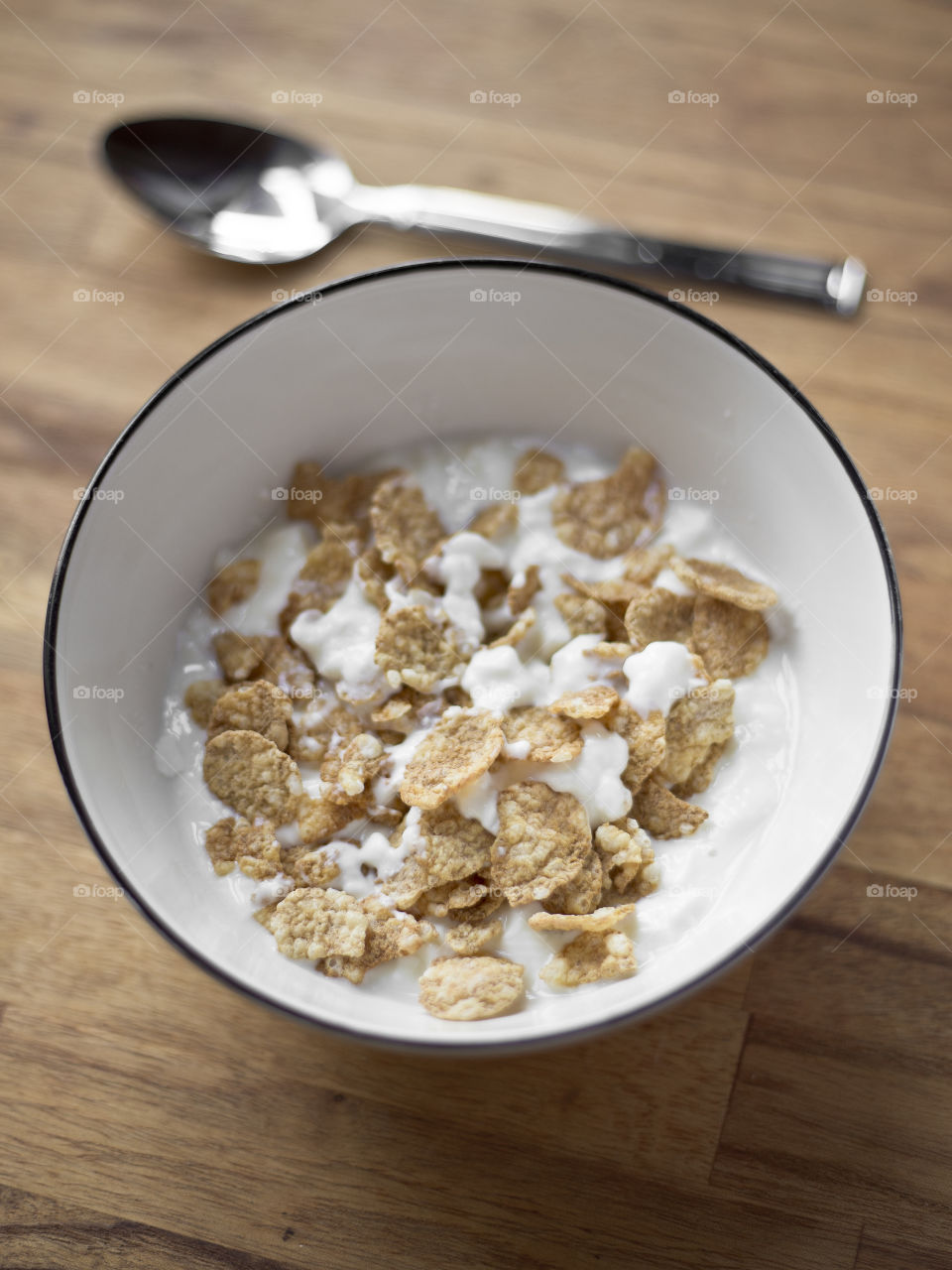 cereal bowl with plain yogurt for healthy breakfast