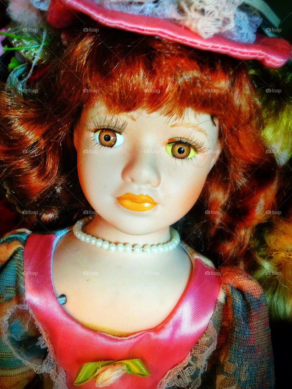 Haunting face of an antique doll