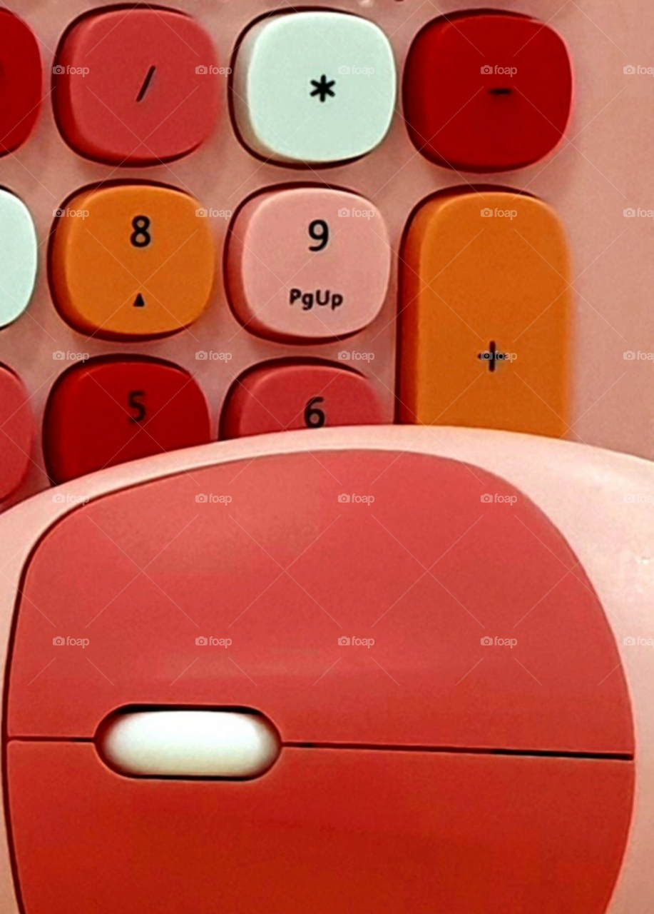 Pinkish keyboard and mouse