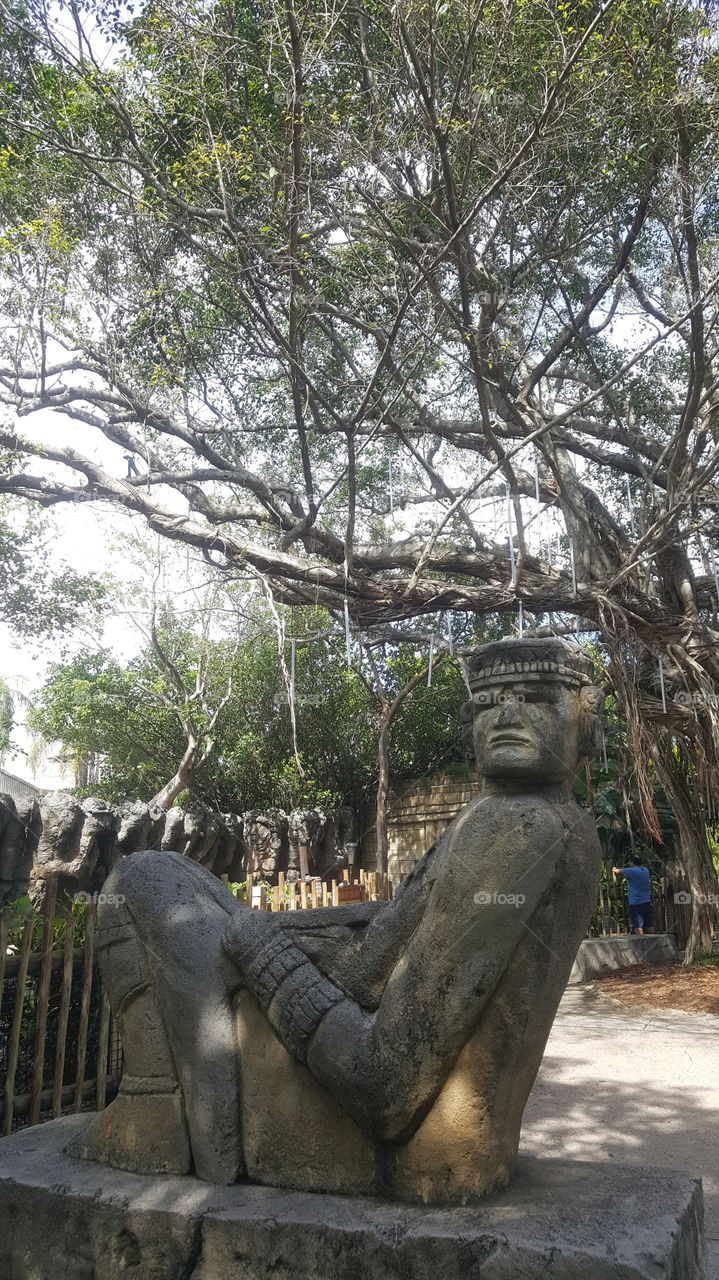 ancient stone statue park zoo nature