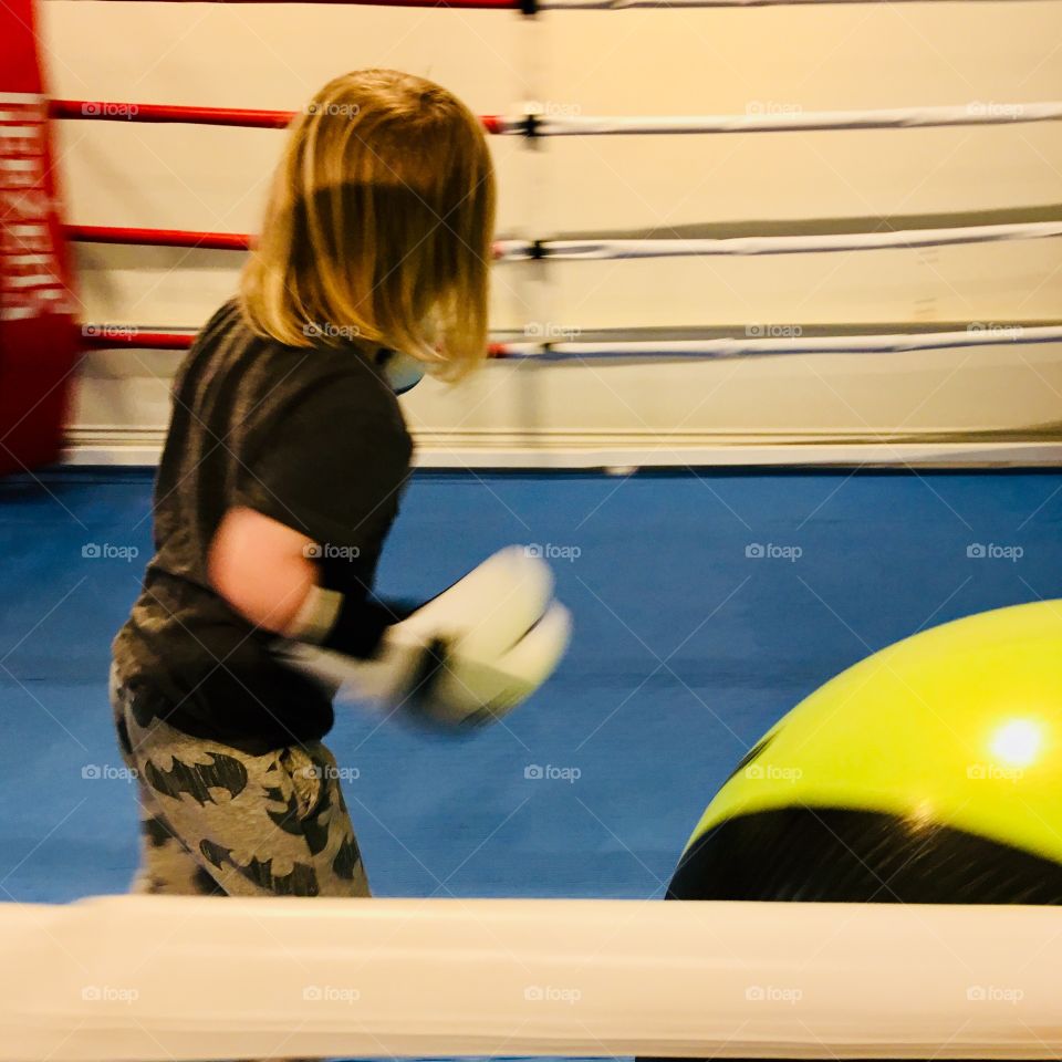 In the blue corner, my boy. Loving his time with dad and experiencing boxing for the first time 