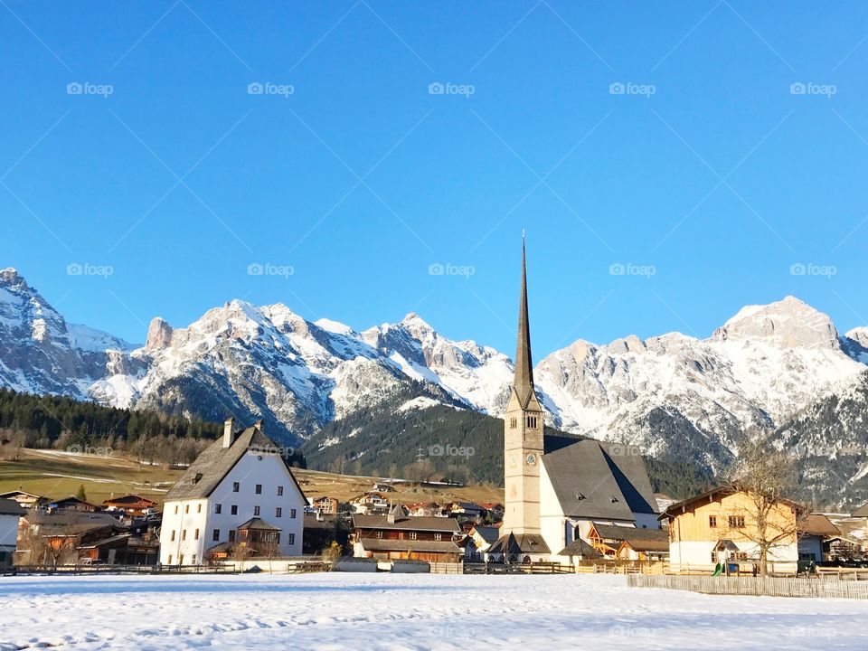Houses and snow mountain in Austria 