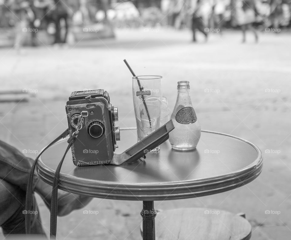 Cafe terrace and retro camera