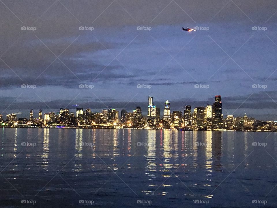 Seattle skyline from the Alki Beach Pier on a cold winter evening 