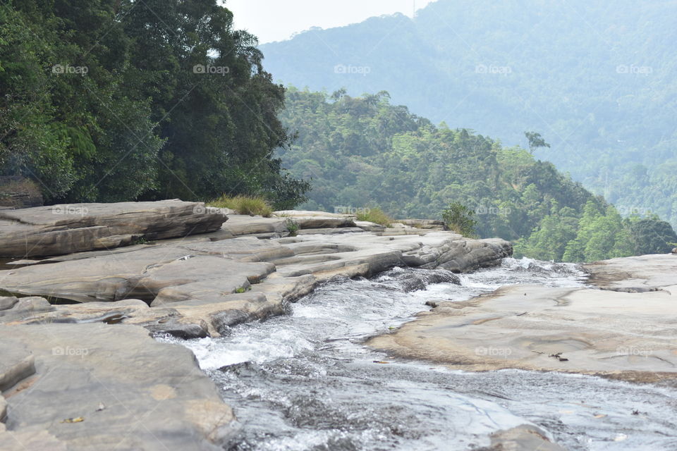On top a Waterfall # water flows so gently so we could have a dip