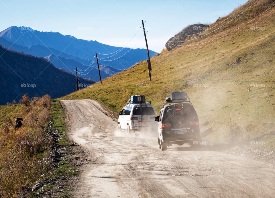 Traveler ‘s car on their long road journey 