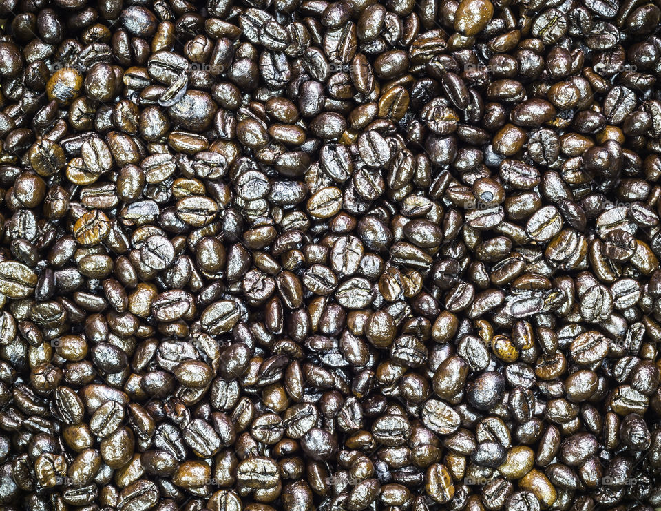 Brown roasted coffee beans. Brown roasted coffee beans background