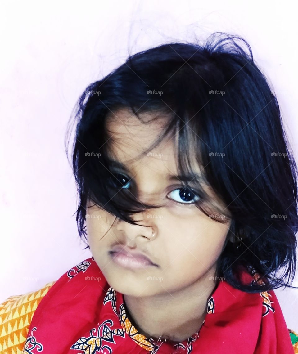 great new model girl kolkata bengali India close-up looking at camera black hair attractive eyes colourful lovely dress background red yellow business photography the best