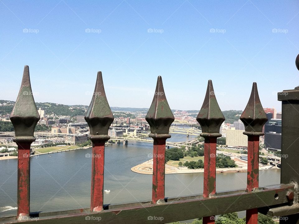 View of Pittsburg, Pennsylvania, taken from behind an old iron fence. 