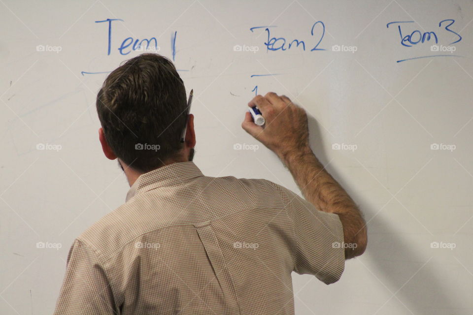 office executive using whiteboard at office 