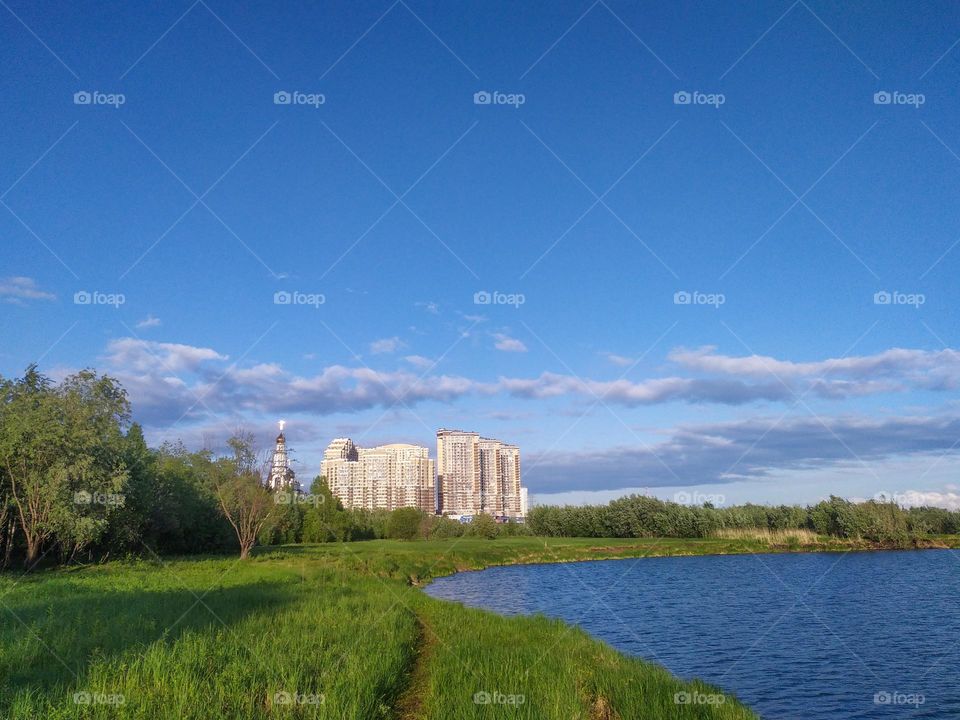 Pond behind houses