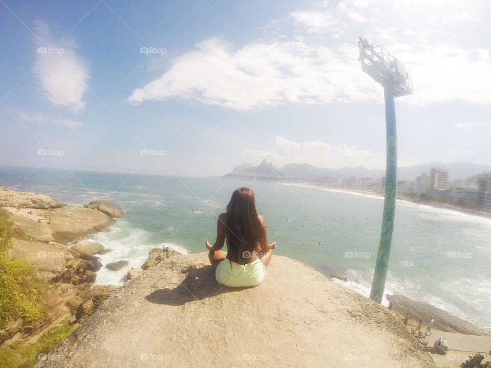 Girl looking at the ocean