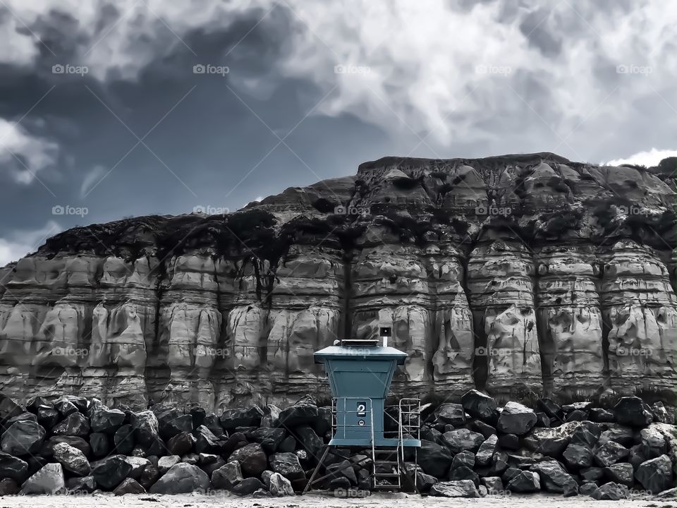 Black and White Foap Mission! Lifeguard Stand Light Blue Gray Against Black and White Sky; Clouds and Sand Cliffs Along The Southern California Coastline!
