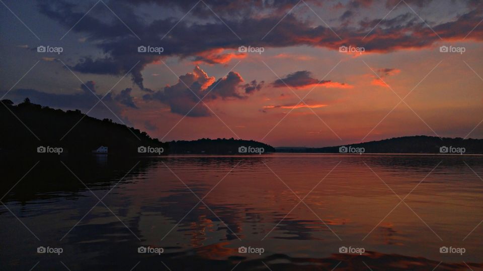 Dramatic sky reflected on lake