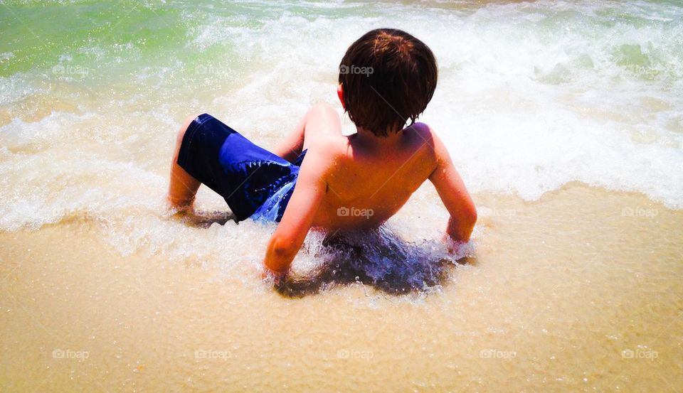 Sitting in the surf