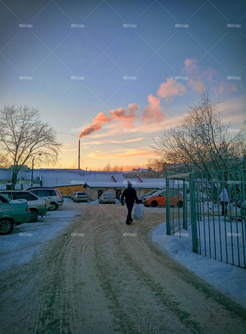 sunset in small town. winter time in small town in the middle of Russia
