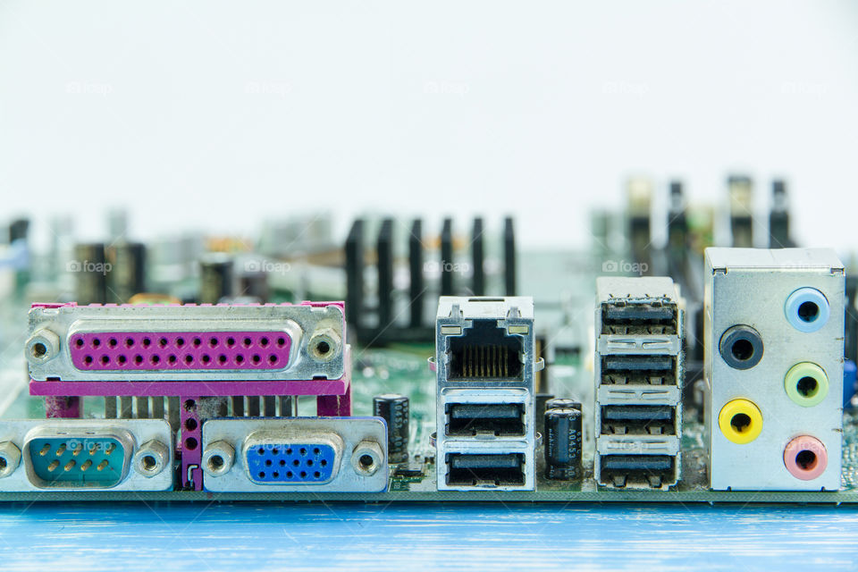 close up of computer motherboard, back view of connectors