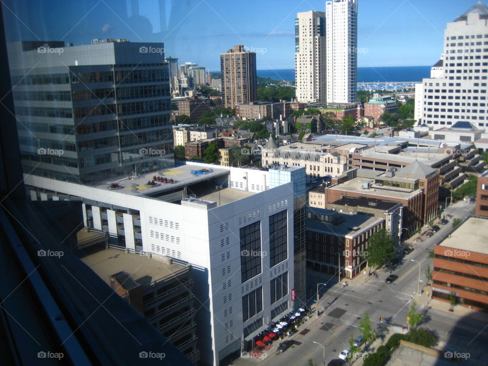 View Thru a Window. Cityscape from a High Floor