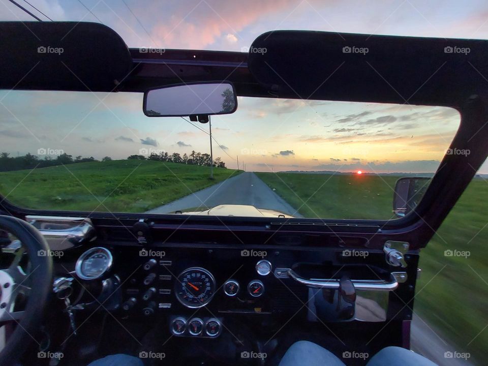 Sweet sunset from the 1978 Jeep CJ top off in the summer time