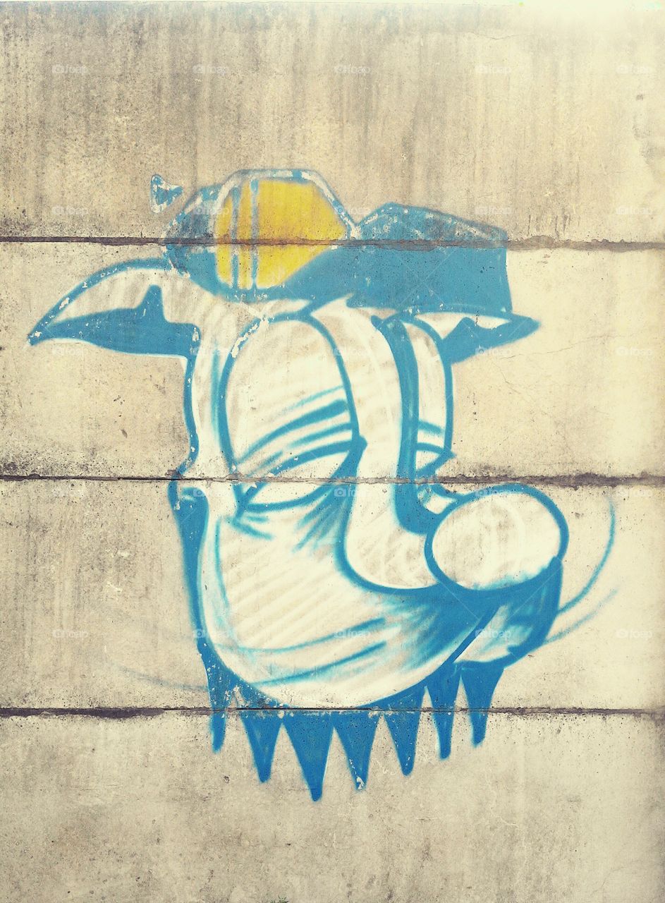 The art of graffiti on a wall exposed : Dog Face