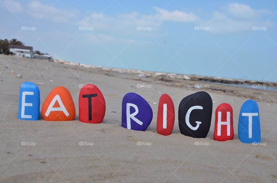 Eat right concept on colourful stones