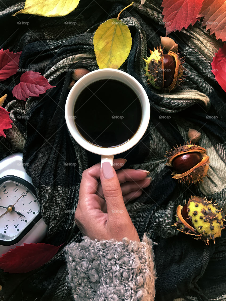 Drinking hot coffee in autumn 