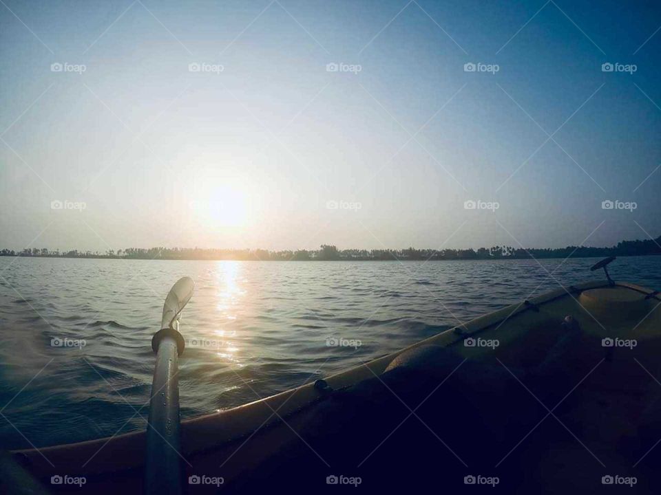 sunset boating fishing