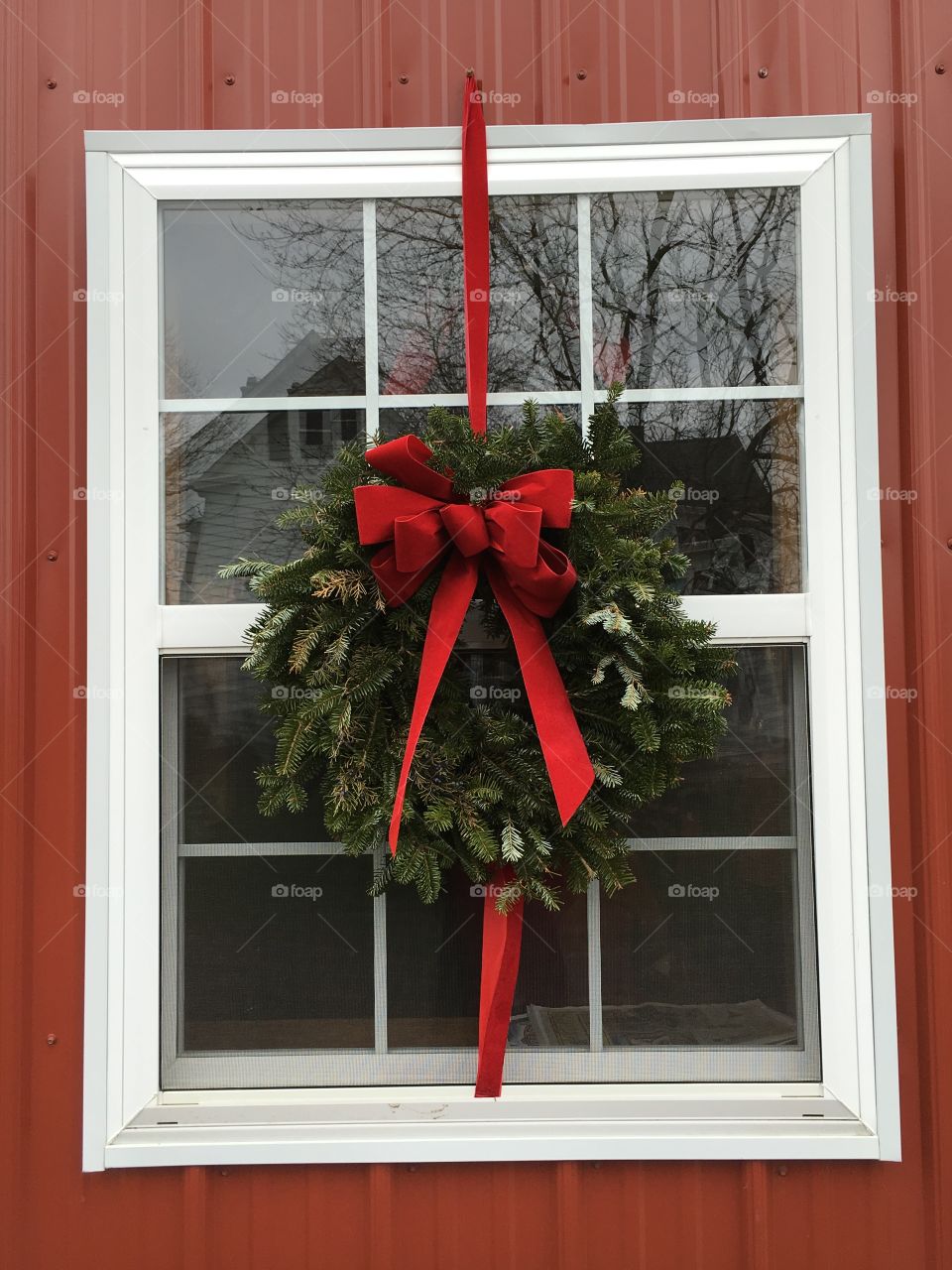 Christmas wreath on window