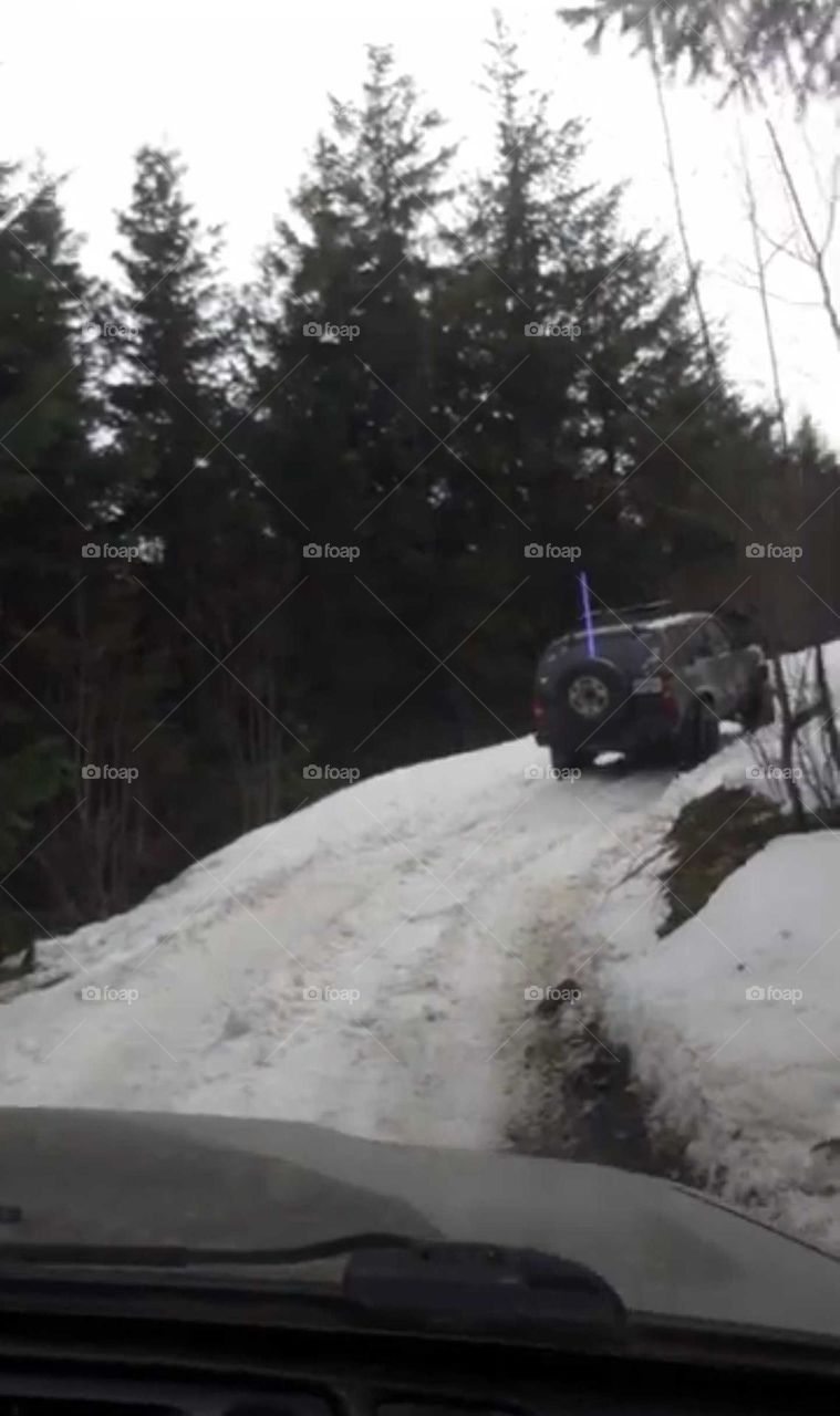 4x4ing up the mountain in the snow