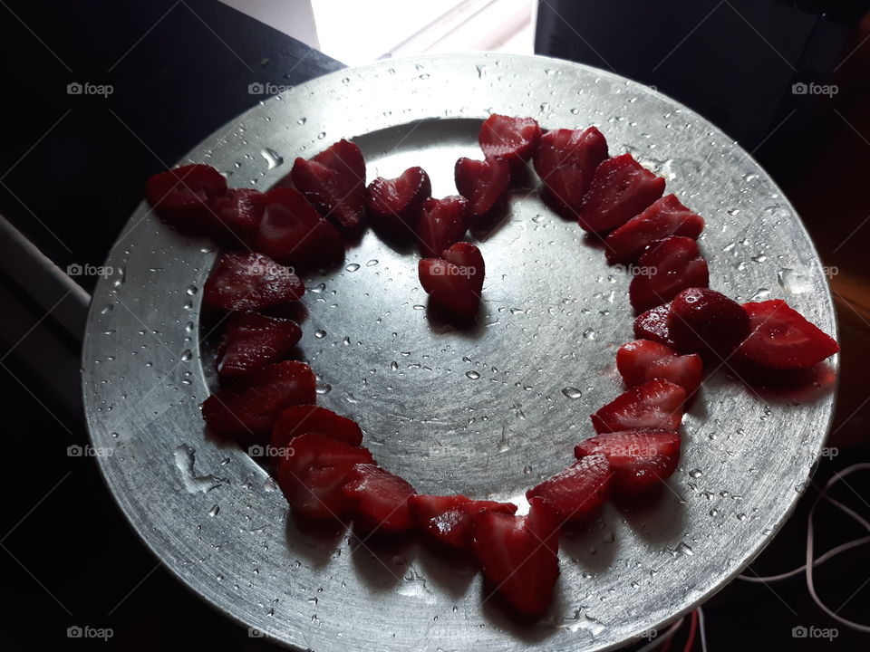 a heart of strawberries