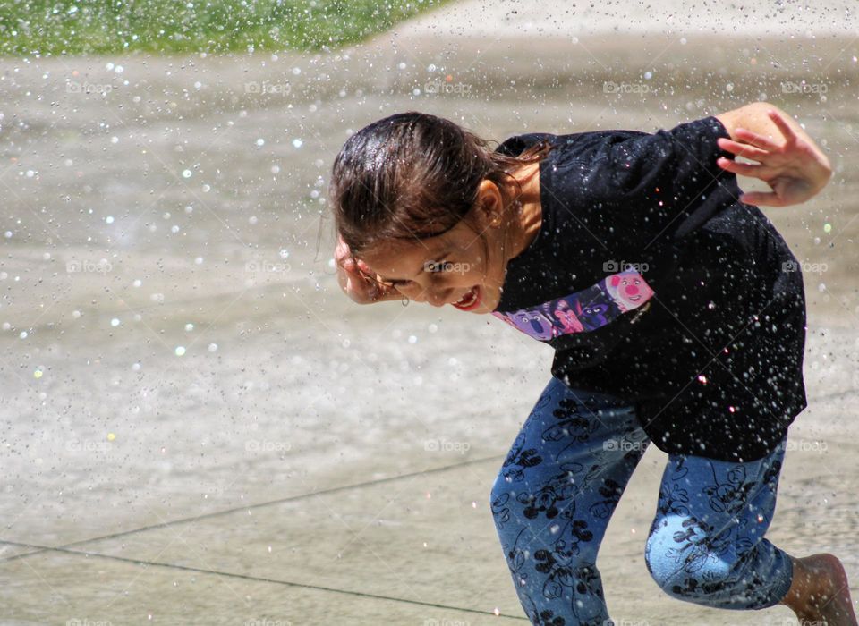 playing water at the park
