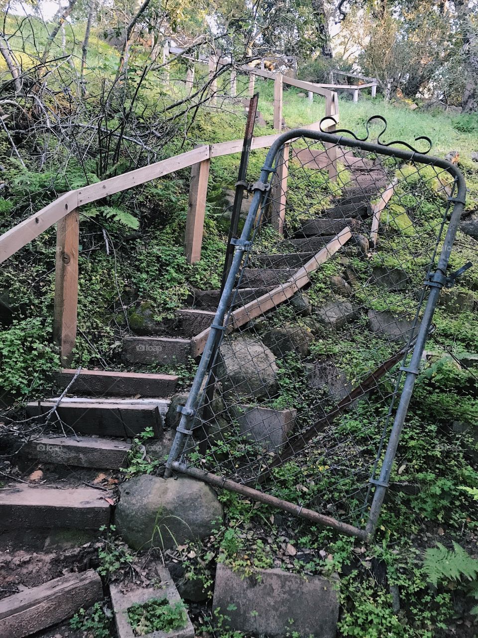 broken gate and stairs