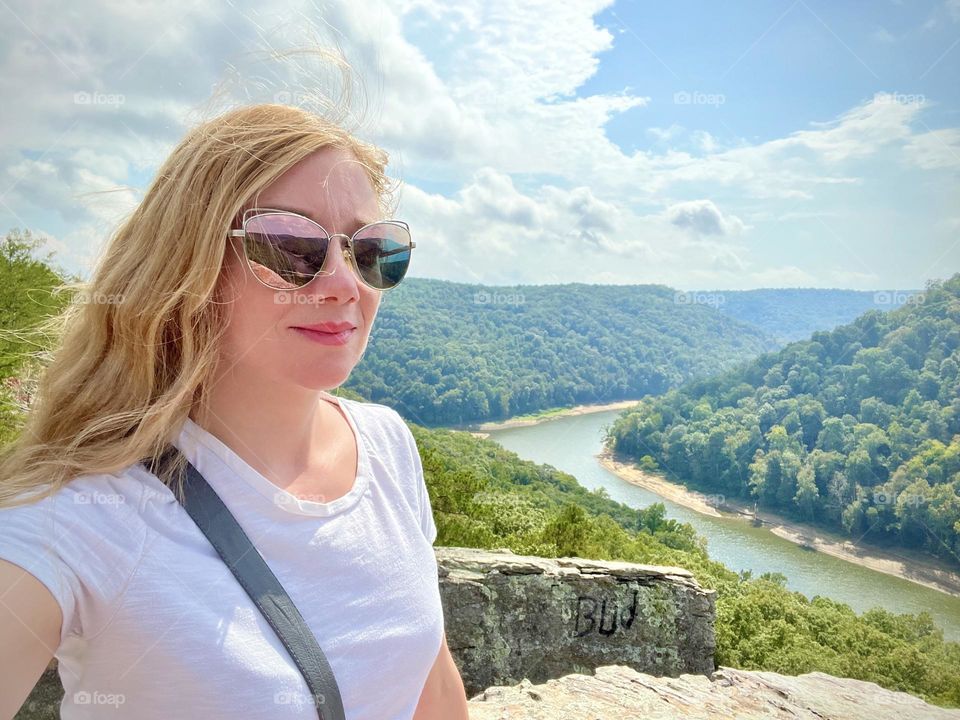 Enjoying the stunning view from Buzzard Rock in the mountains of Kentucky 