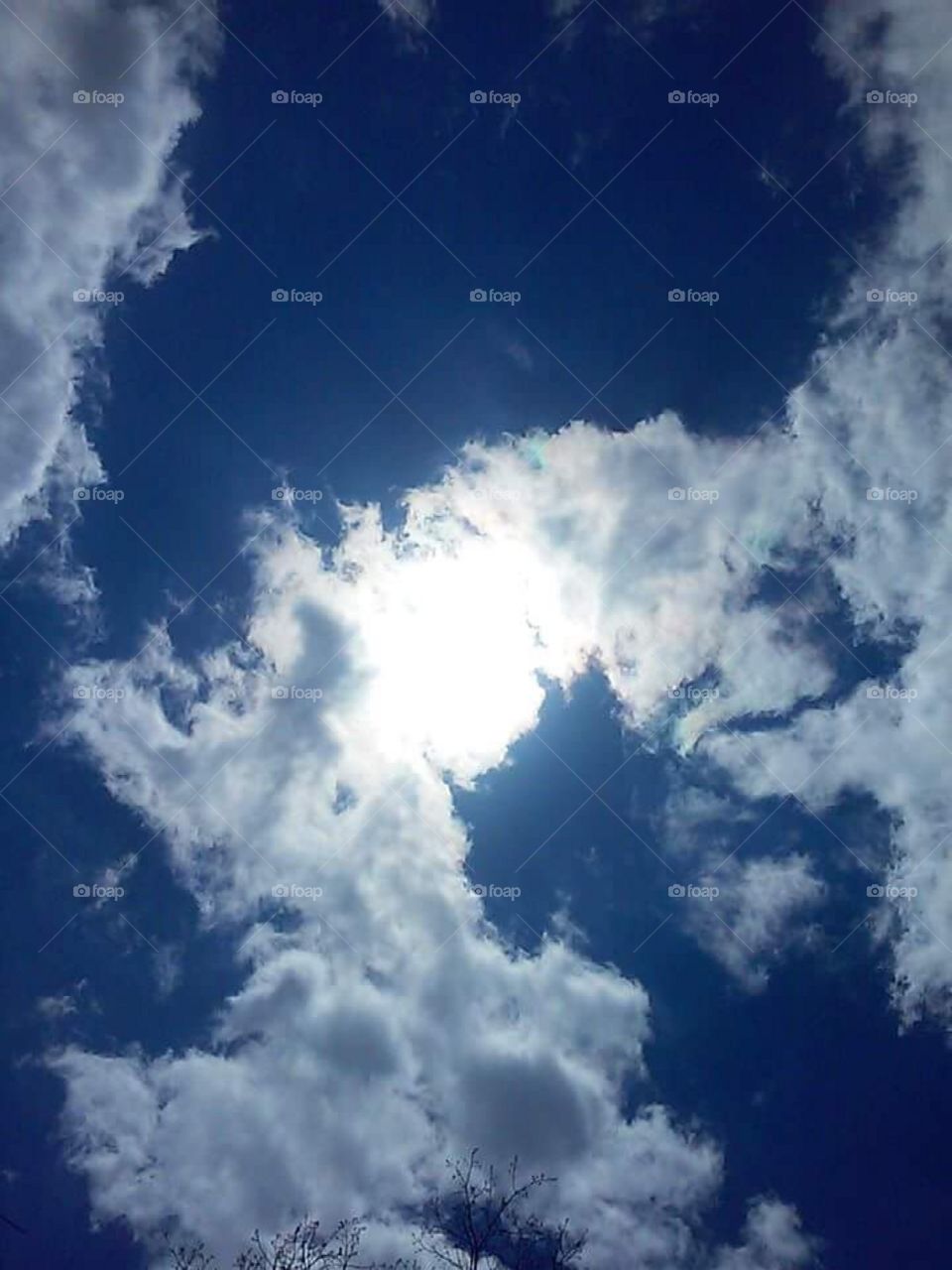 The sun hugged by the clouds