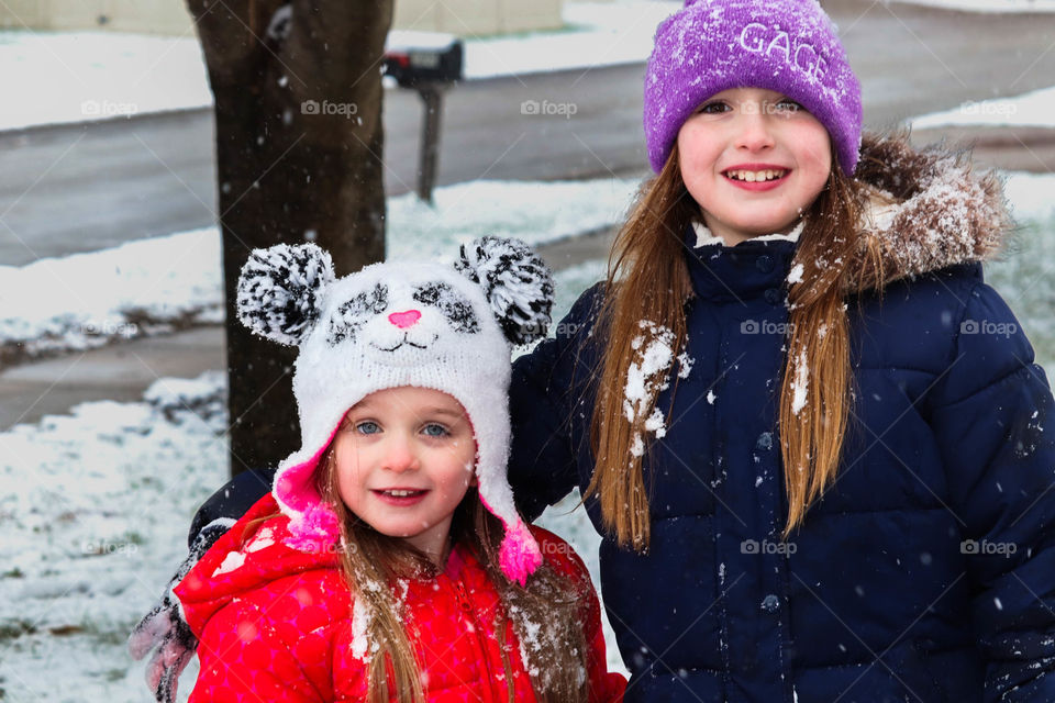 sisters in the snow