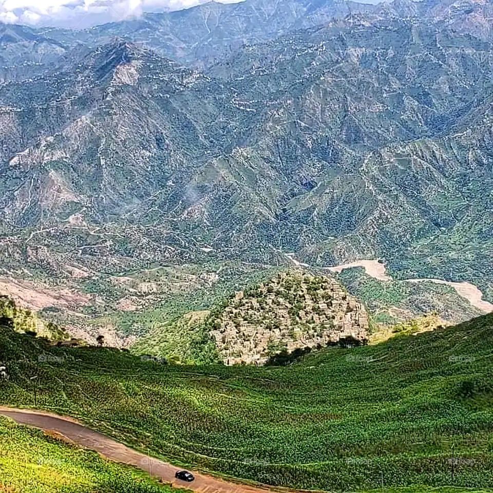 Glory be to God, the magnificent and picturesque view and the natural green trees are a view that is nothing more wonderful than it