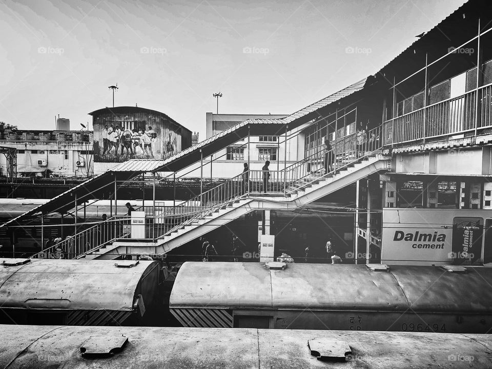 Vintage style black and white photograph of a railway station 
