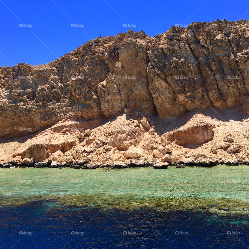 Desert rocks falling in the Red Sea Egypt 