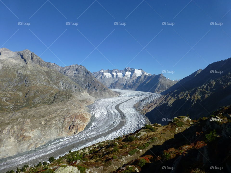 Aletsch glacier in the mountains shrinking every year.