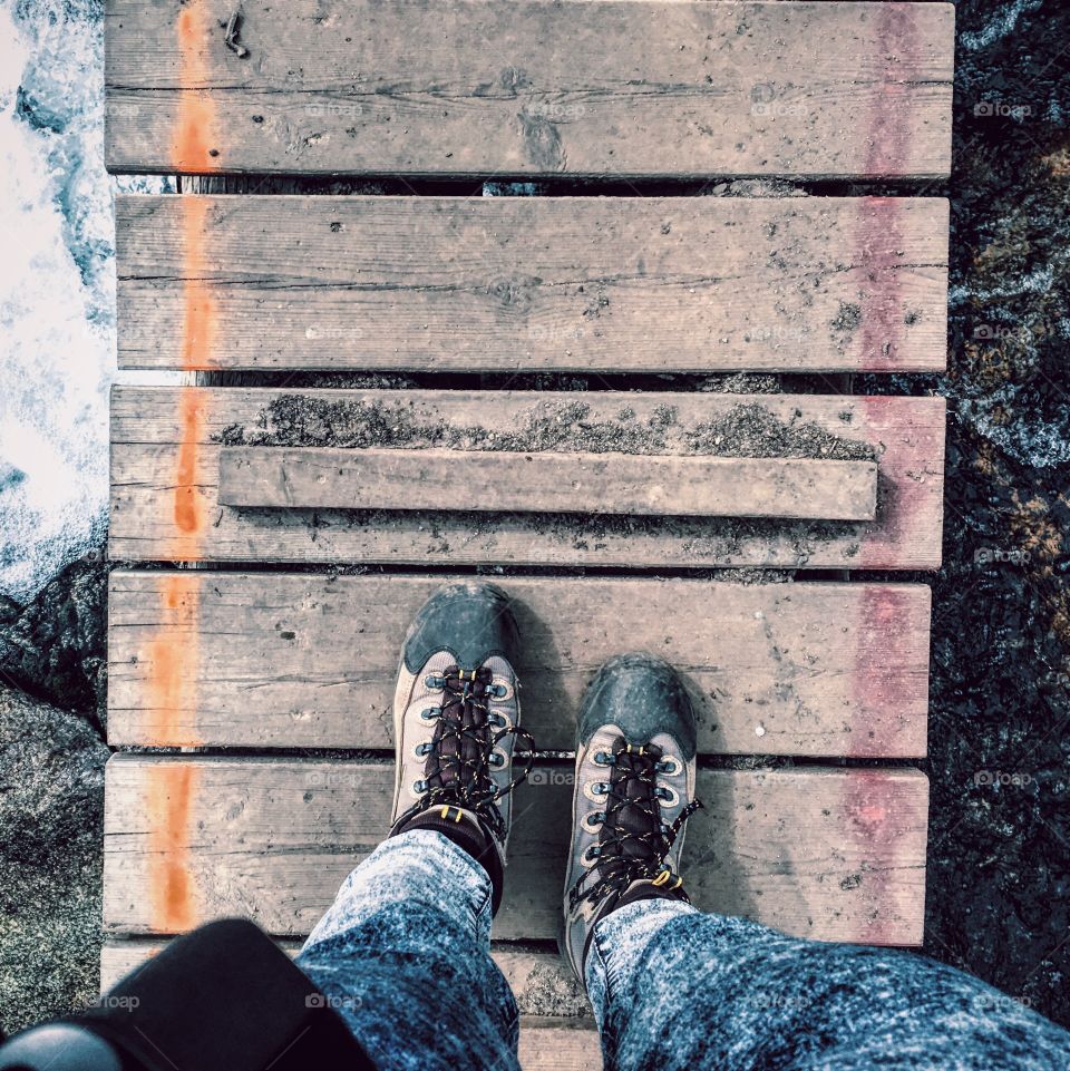 Feet view at the bridge