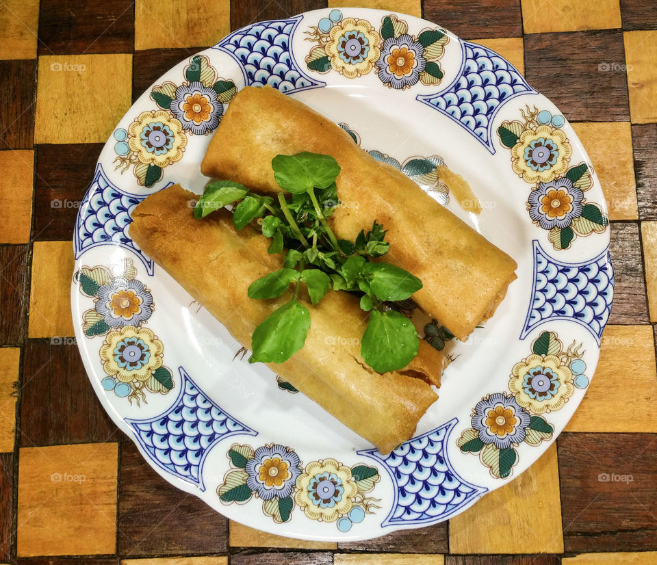 High angle view of spring rolls in plate