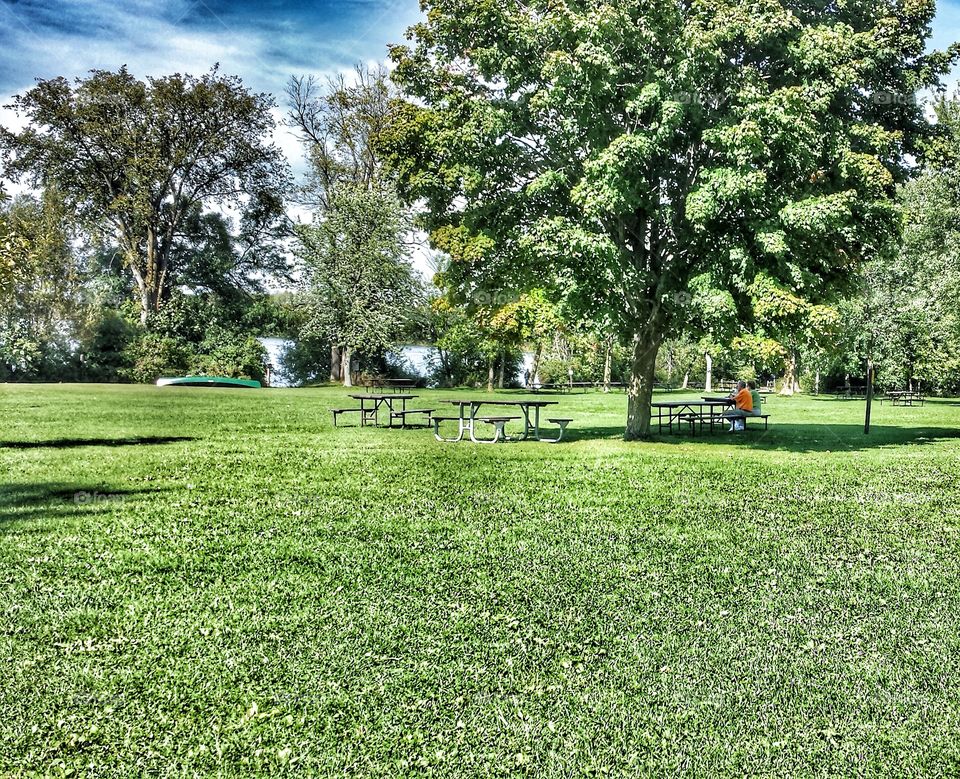 Enjoying Nature. Couple Enjoying a Warm Day in Early Autumn