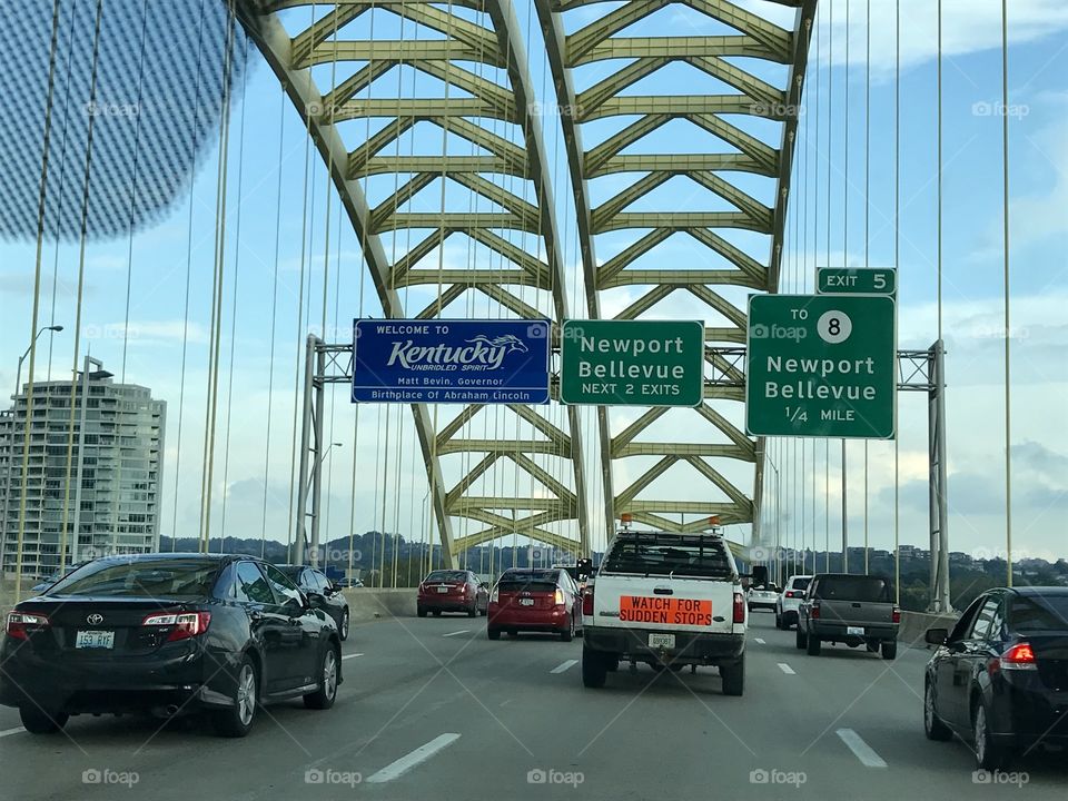 Kentucky Ohio border welcome sign on highway 