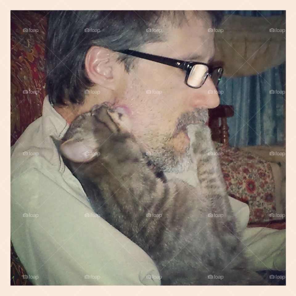 Daddy and his kitten. Jax gives his daddy some lovin